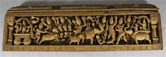 An Indian teak pediment, 19th century 43.5cm x 141.5cm